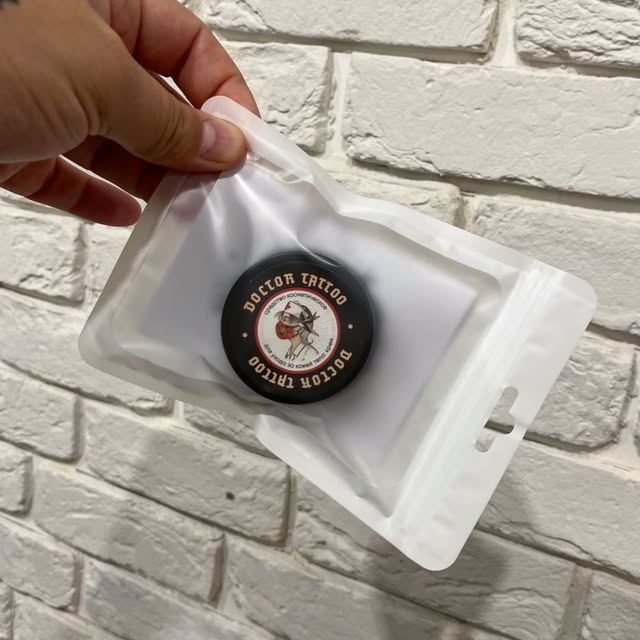 Банка Doctor Tattoo в индивидуальной упаковке из профиля бренда